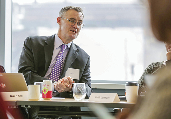 Man speaking at table