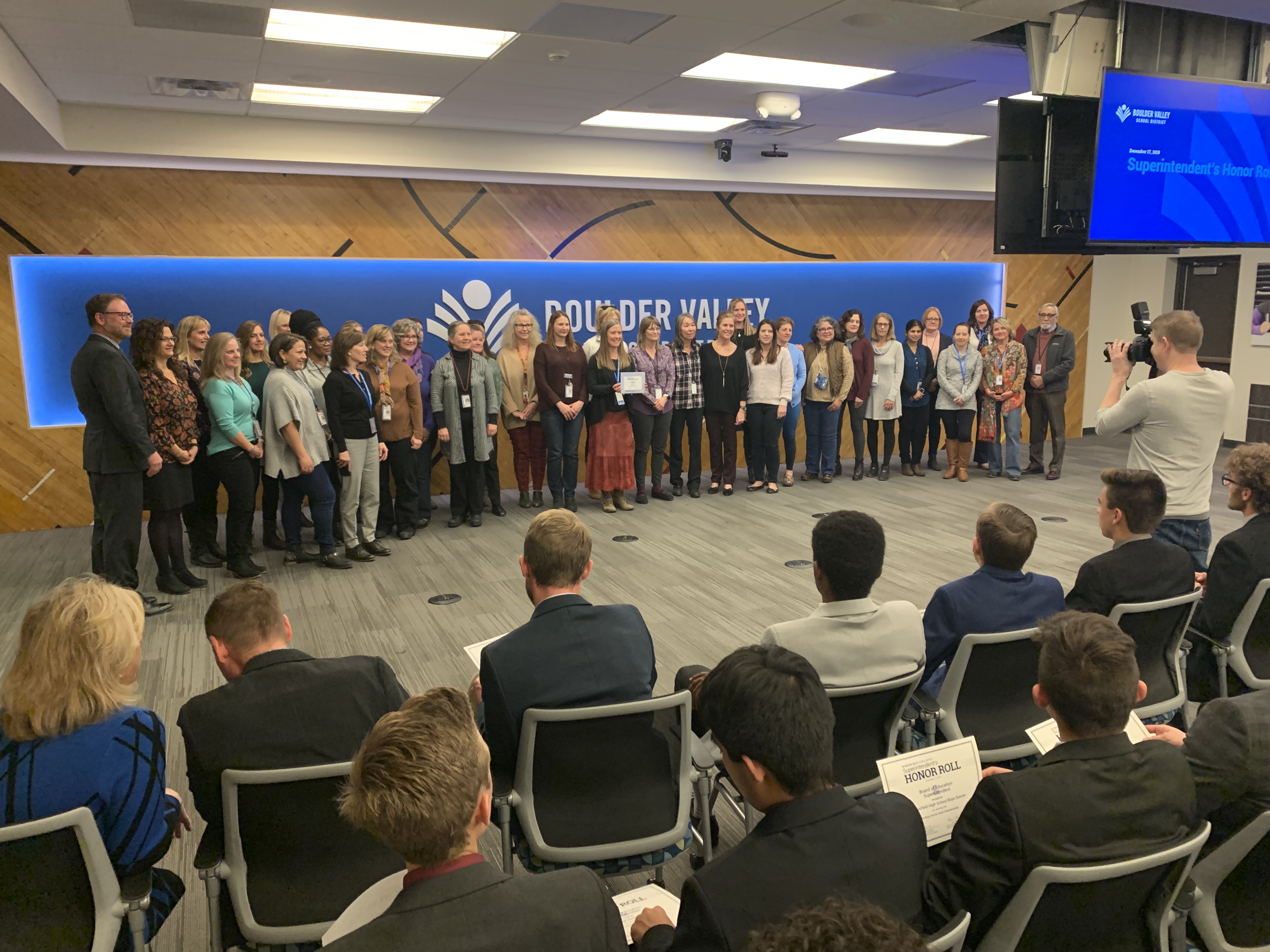 Superintendent Rob Anderson poses for a photo with our school nurses and paras during a Superintendent's Honor Roll