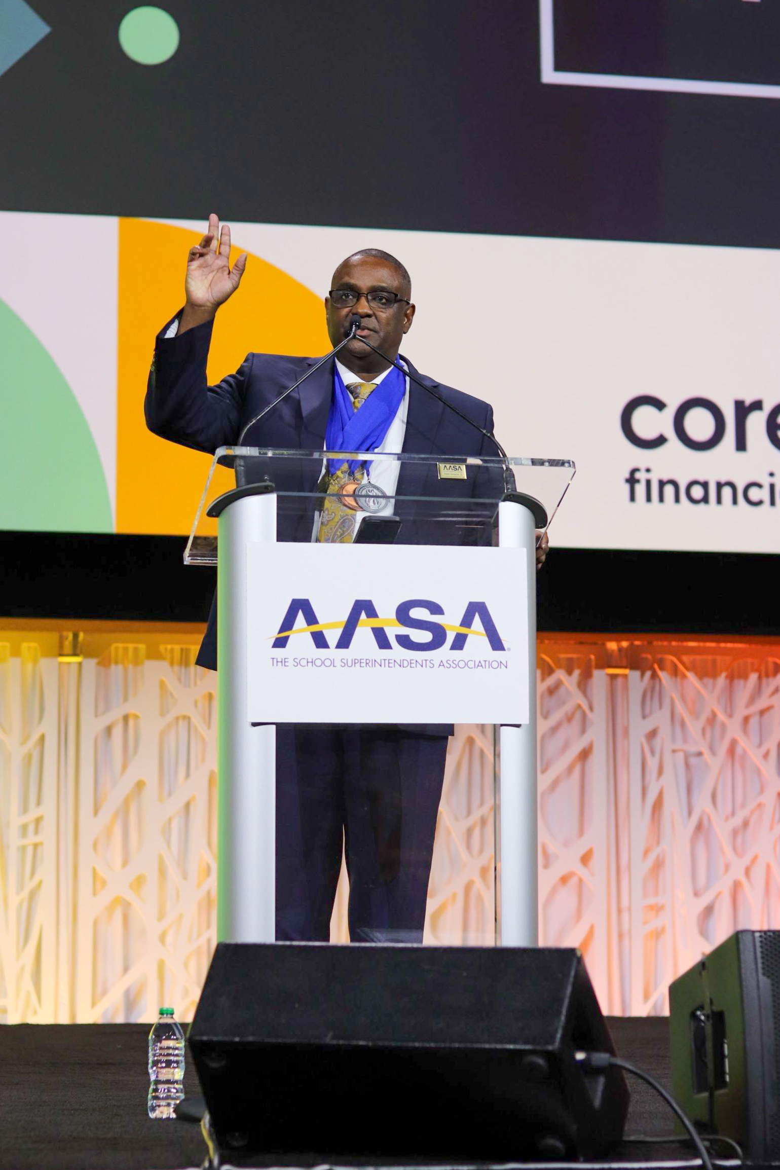 Walter Gonsoulin at podium