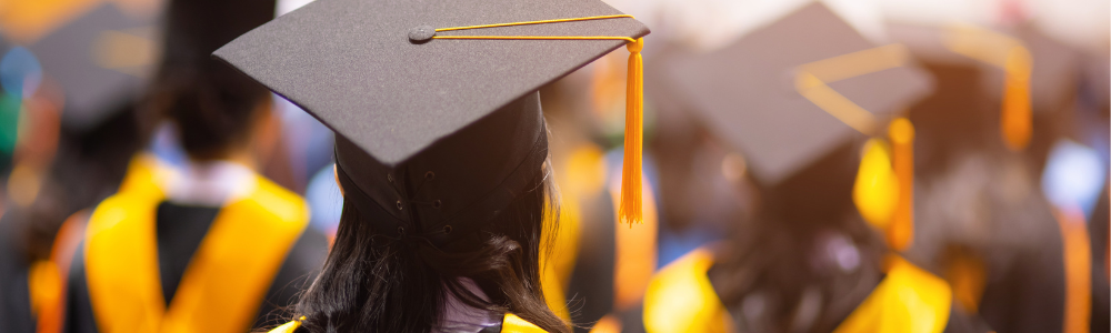 Room of graduates with caps and gowns