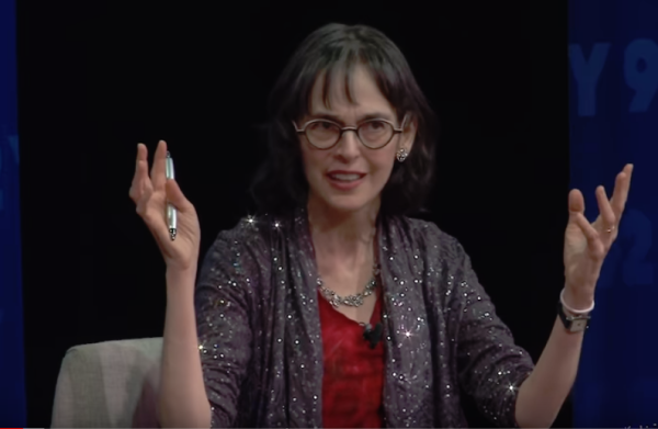 Lenore Skenazy speaks on stage at an event